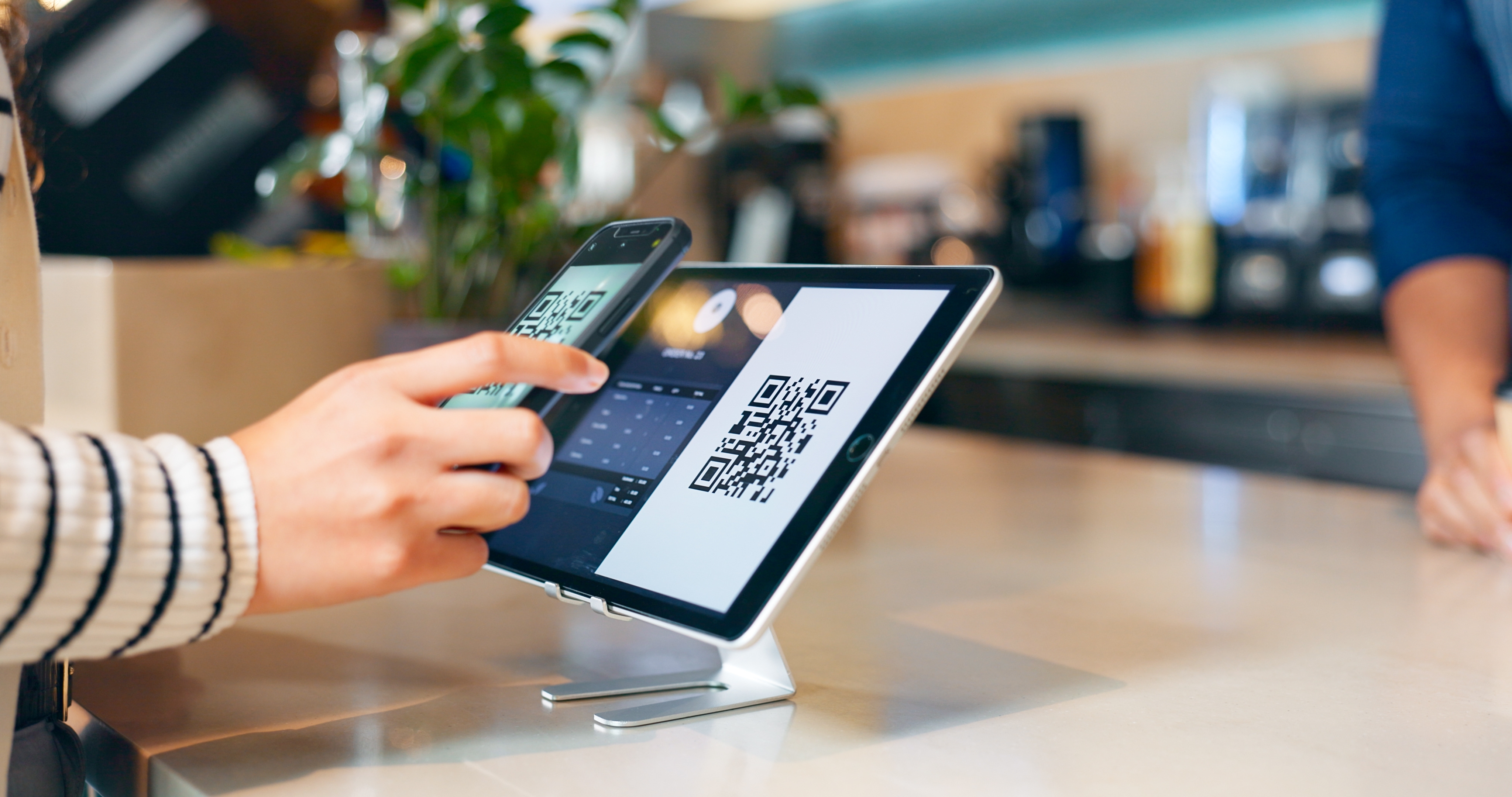 Customer checking out with touchscreen POS system